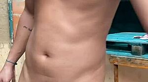 Pornstar masturbates to orgasm on rooftop terrace