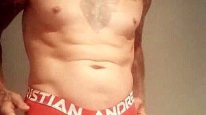 Blue-eyed tattooed amateur masturbates with monster cock solo