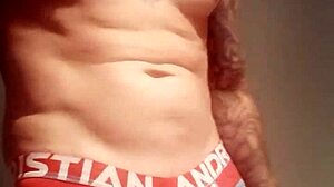 Blue-eyed tattooed amateur masturbates with monster cock solo