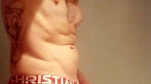 Blue-eyed tattooed amateur masturbates with monster cock solo