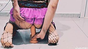 Watch the sissy take that anal dildo.