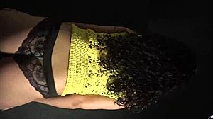 Shaking her booty to the beat in a sexy outfit