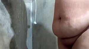 branquinha bunduda taking a shower in the bathroom