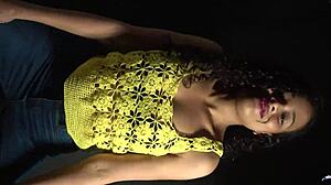 Shaking her booty to the beat in a sexy outfit