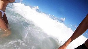 Couple's Beach Stroll Leads To Tender Passion