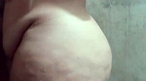 branquinha bunduda taking a shower in the bathroom