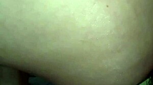 the woman enjoys using a big thick zucchini