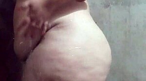 branquinha bunduda taking a shower in the bathroom