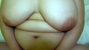Beautiful Japanese MILF with natural large breasts pregnant and horny