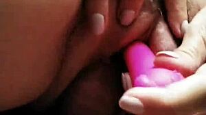 Using Pink Vibrator While Getting Fucked In Pussy And Arse