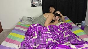 Young Colombian jerks off to Spanish porn on his phone, stepmom helps out