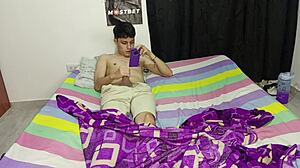 Young Colombian jerks off to Spanish porn on his phone, stepmom helps out