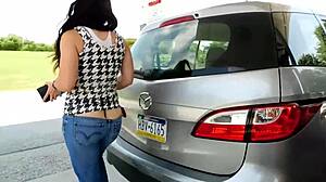 Whoa, car wash babe flashes big ass in tight low-rise jeans!