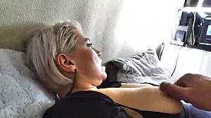 Aimee MILF sucks cocks in group scene.