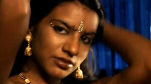 brunette indian girl does erotic striptease, ripping clothes while dancing nude