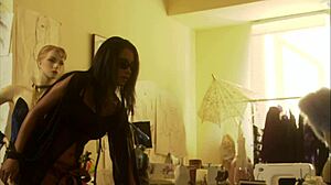 two asian milfs fucking with strapons in the rain, licking each other