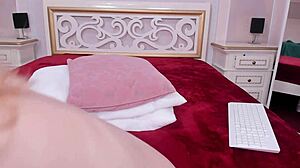 Skinny student seduces curvy boss with sensual dance in candlelit room.