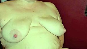 A big girl squirts while having sex with a cucumber