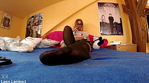 chrissy shows off her sexy feet in black stockings and lingerie