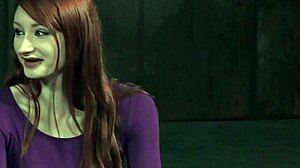 Red-haired BDSM submissive gets flogged and teased with a vibrator