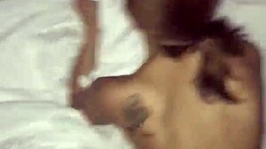 skinny latina checks into a hotel room.