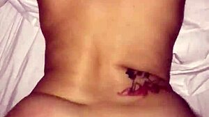 skinny latina checks into a hotel room.