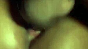 Two black beauties enjoy double penetration in a missionary position