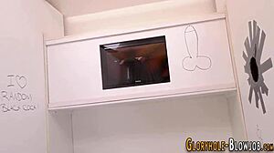 Fucked whore blows huge black cock at gloryhole