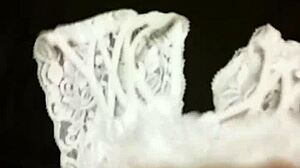 Discover the thrill of self-pleasure using wife's intimate garments in a private moment of indulgence