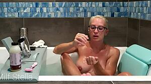 Bathing session with stella involving shaving in the bathroom