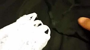 Discover the thrill of self-pleasure using wife's intimate garments in a private moment of indulgence