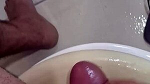 Pornstar Masturbates In Bathroom, Leaving It Sticky With Creampie