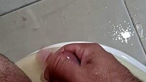 Pornstar Masturbates In Bathroom, Leaving It Sticky With Creampie