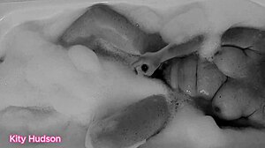 kity hudson indulges in a steamy bath with her favorite toy