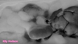 kity hudson indulges in a steamy bath with her favorite toy