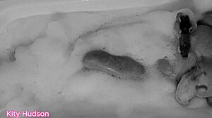 kity hudson indulges in a steamy bath with her favorite toy