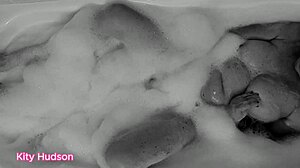 kity hudson indulges in a steamy bath with her favorite toy