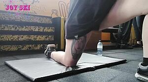 Alternative Girl Stretches At The Gym