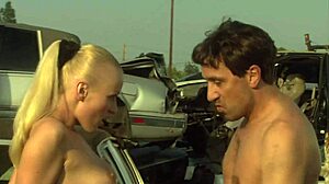 Hot sex in a car yard with a beautiful blonde in boots