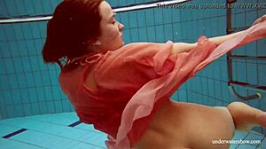 Russian teen Deniska strips in the water