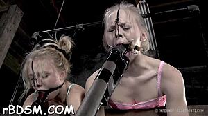 Beautiful woman in chains in hardcore BDSM scene