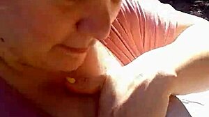 Girlfriend with Huge Tits Rubs Them Outdoors in Public