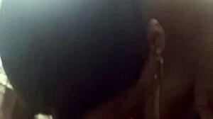 Beautiful mature woman with a curvaceous body enjoys red wine and moans of pleasure