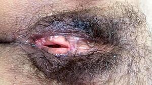 Hairy pussy drained after endless fucking and huge cum