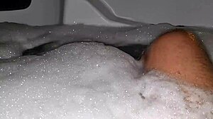 Hot relaxing bath with foam, steamy, intimate setting