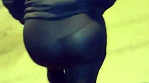 A mature woman with a big ass in stockings