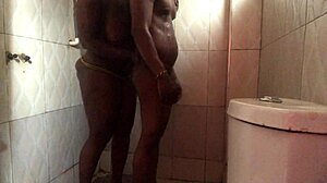 enjoying the bathroom, she bends over for fingering