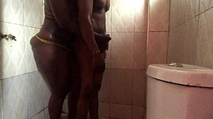 enjoying the bathroom, she bends over for fingering