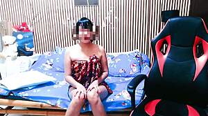 Private striptease performance by an amateur dancer in a cozy setting