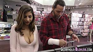 Ethnic brunette babe sucks and tugs big cock at gloryhole in HD